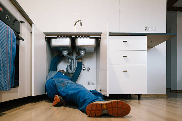 Professional Drain Cleaning technician working in Farmersville, IL